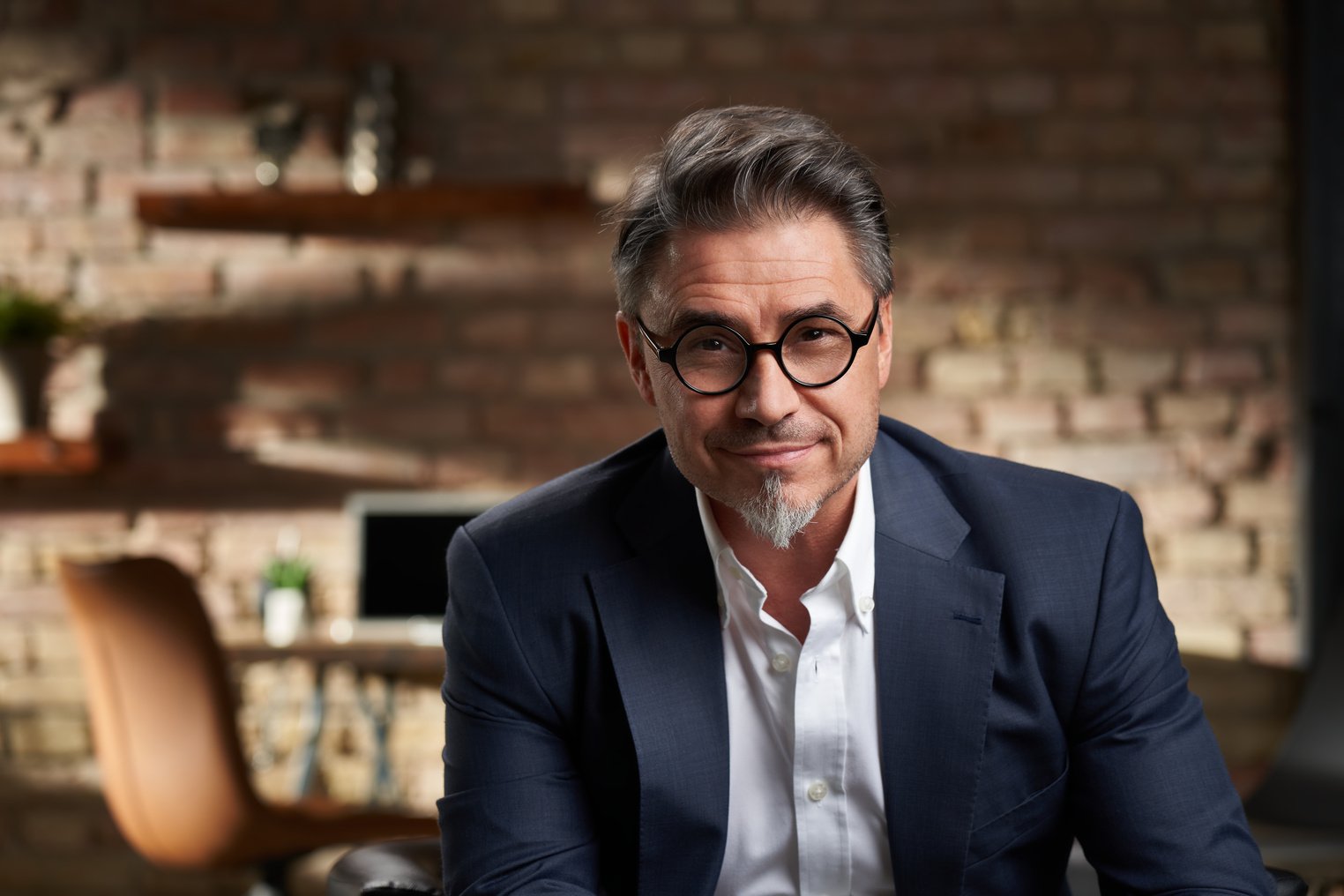 Portrait of Older Business Man in Home Office